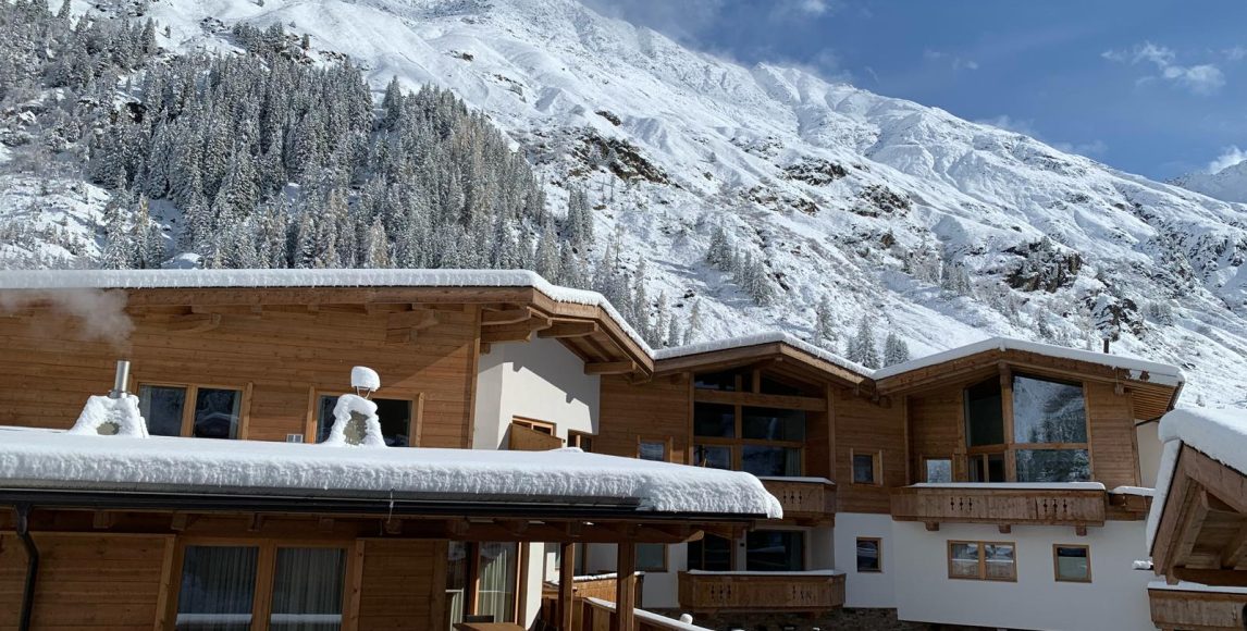 Horský chalet s rezortným zázemím a alpskou panorámou